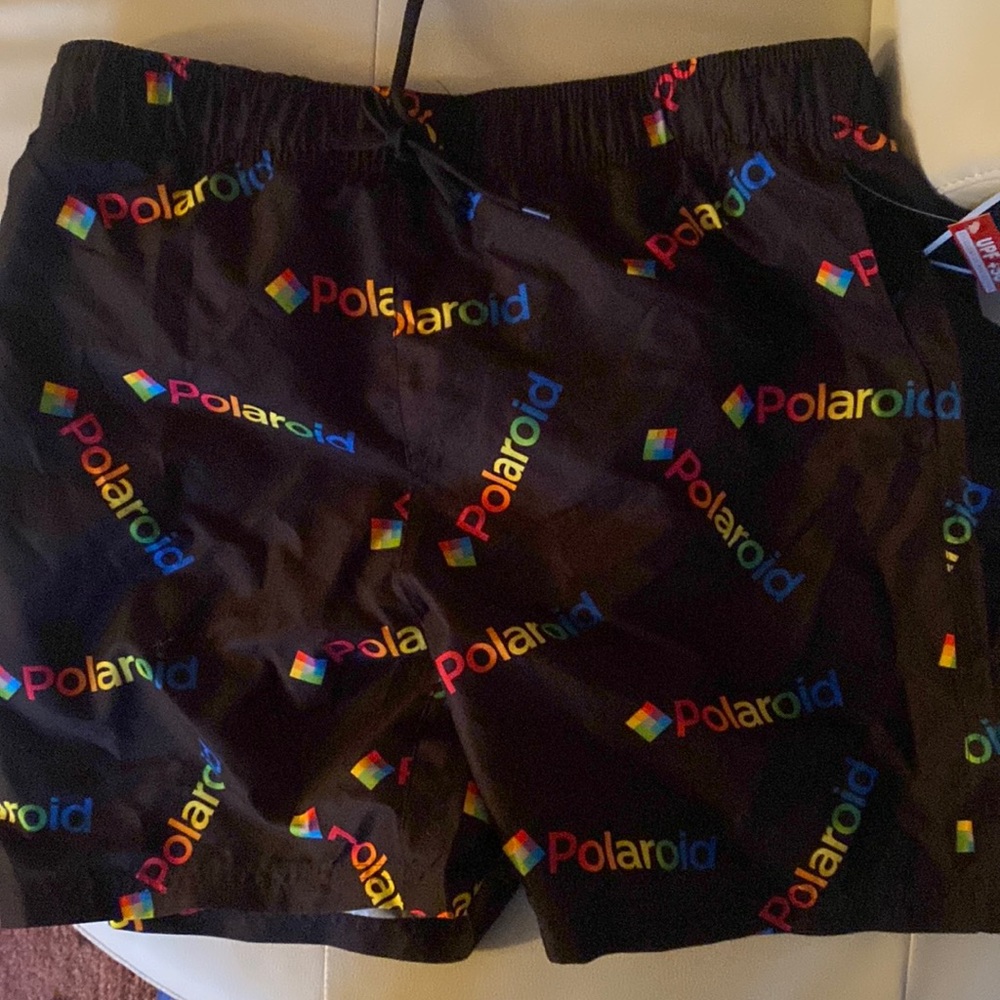 Brand Name: Polaroid. Waist size: XL Color: Black with Rainbow colors